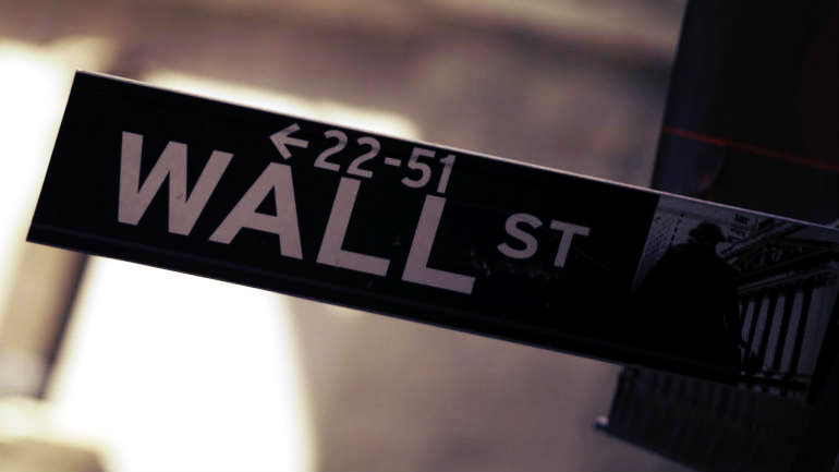 Wall Street Rises, Limps Across the Finish Line of a Turbulent Year